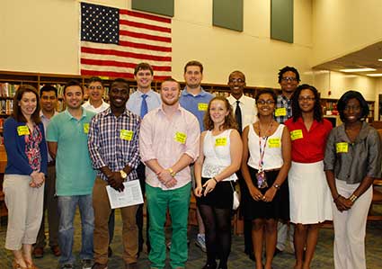 Twelve UWG research assistants recently presented their research to hundreds of high school students during a STEM poster session at Lithia Springs High School. 